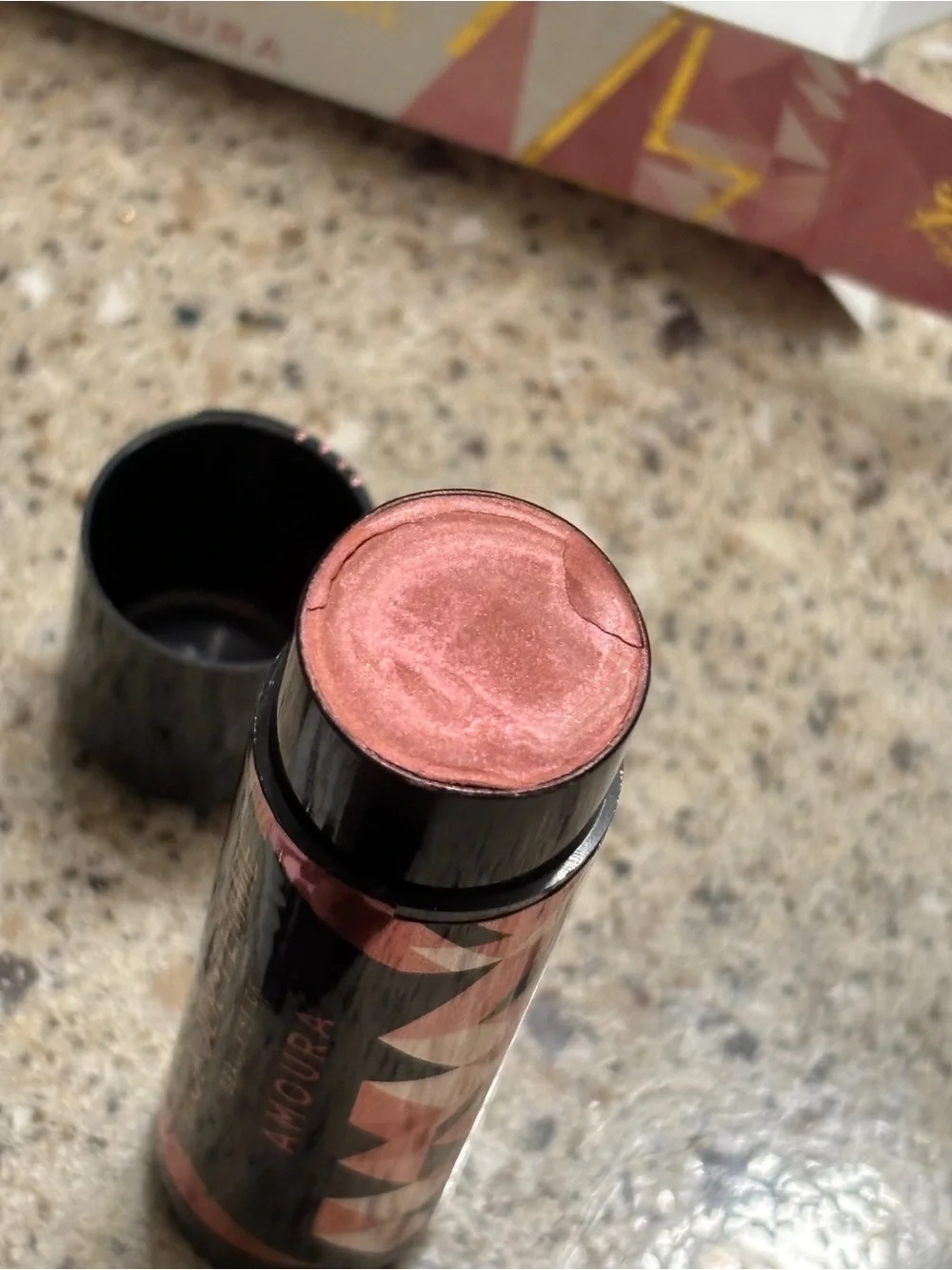 Amoura Beauty Stick in Shimmery Coral Pink